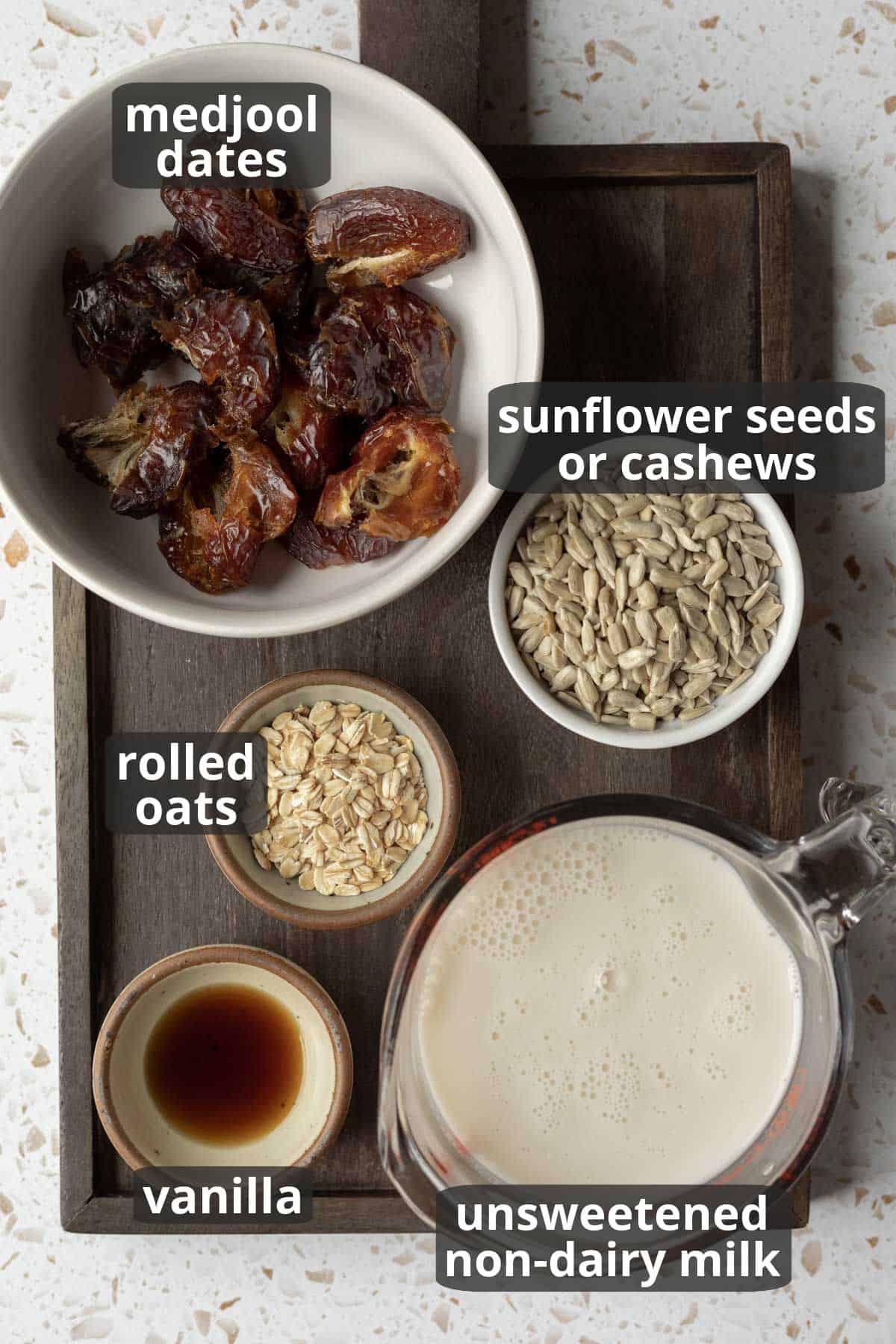 A labeled photo of the 5 ingredients needed for date ice cream.