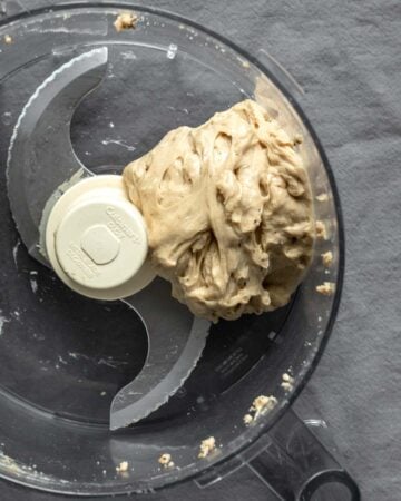 Processing the smaller section of seitan in the food processor.