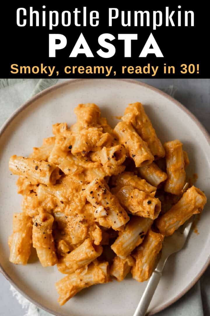 Pumpkin pasta on a plate with title text overlay for saving on Pinterest.