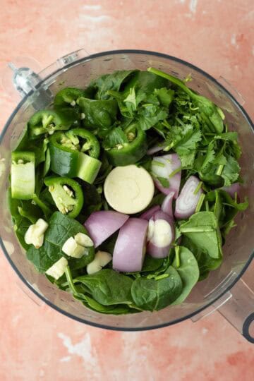 Spinach, shallot, jalapeno, and garlic in a food processor.