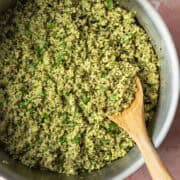 A large pot full of green quinoa made with spinach and cilantro.