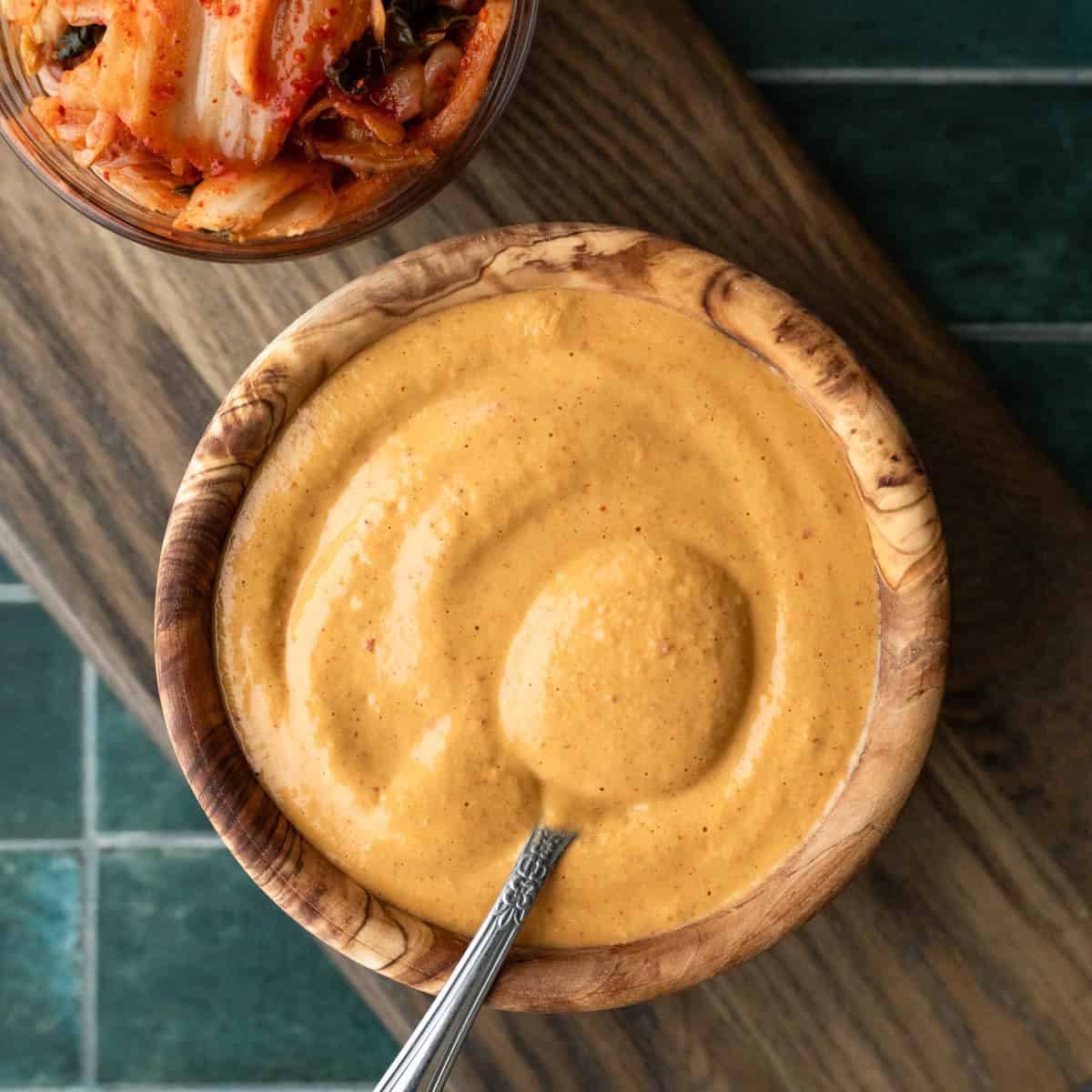 Thick tofu salad dressing in a wood bowl.