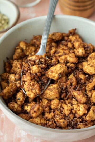 A bowl filled with vegan sausage tofu crumbles.
