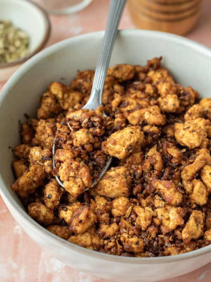 A bowl filled with vegan sausage tofu crumbles.