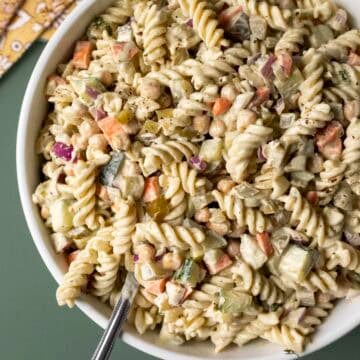 Creamy dill pickle pasta salad in a large serving bowl.