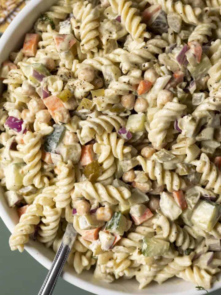 Creamy dill pickle pasta salad in a large serving bowl.