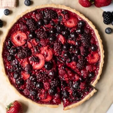 Overhead view of baked mixed berry tart in a gluten-free vegan crust.