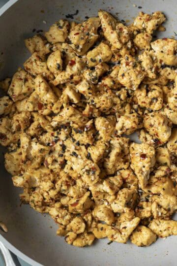 Spicy togarashi extra firm tofu scramble in a skillet.