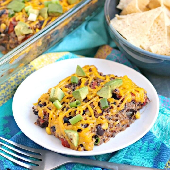 A serving of black bean casserole on a white plate.