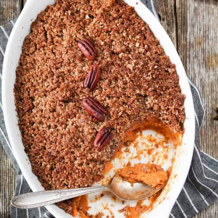 Overhead view of a large baking dish filled with vegan sweet potato casserole.