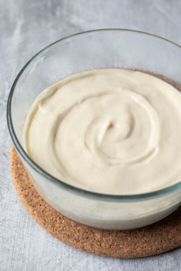 The pudding transferred to a dish to cool.