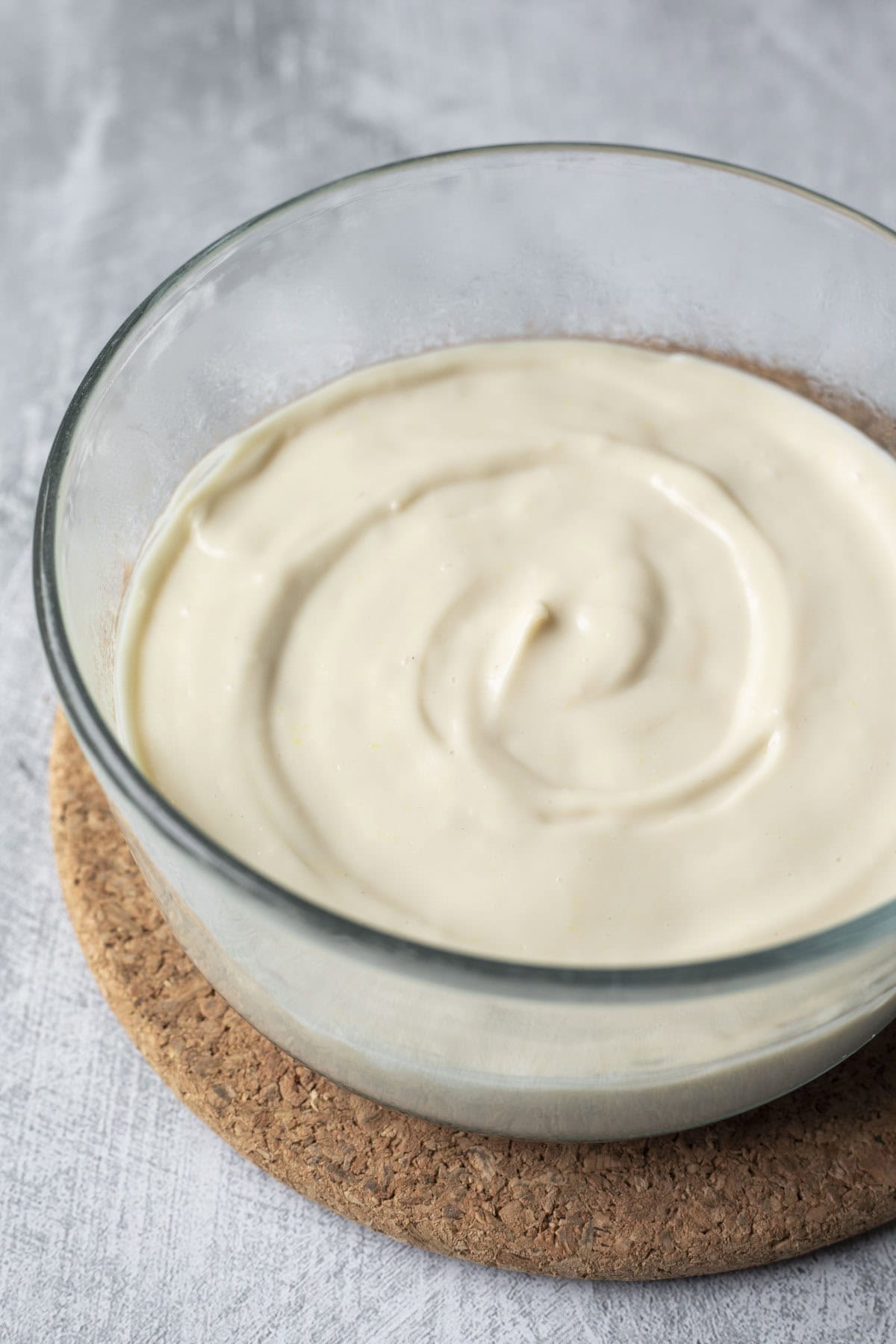 The pudding transferred to a dish to cool.