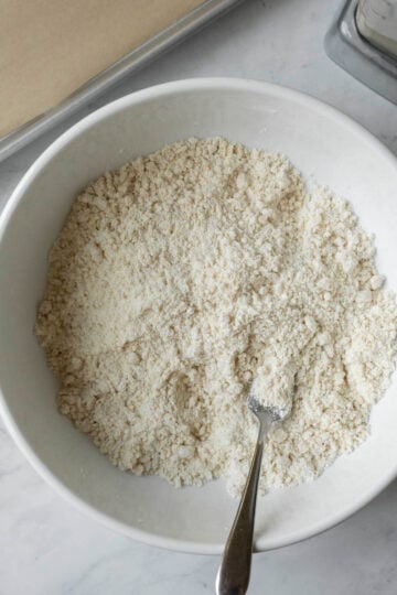 Showing the texture of the flour after the fat is cut in.