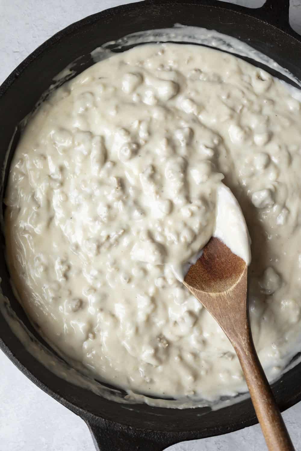Showing how much the gravy thickens as it cooks.
