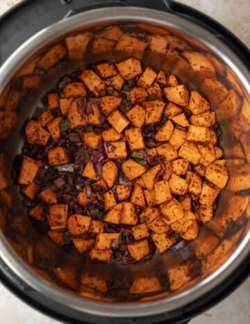 Cubed sweet potato added to the pot.