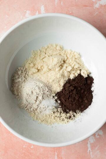 Dry ingredients for the gluten free chocolate dirt in a large mixing bowl.