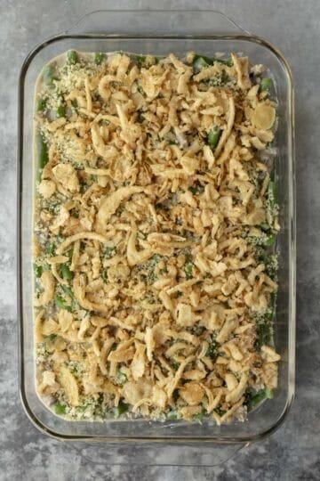 The casserole is topped with panko and crispy French fried onions before being baked in the oven.