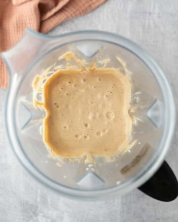 Creamy peanut butter pie filling inside a blender.