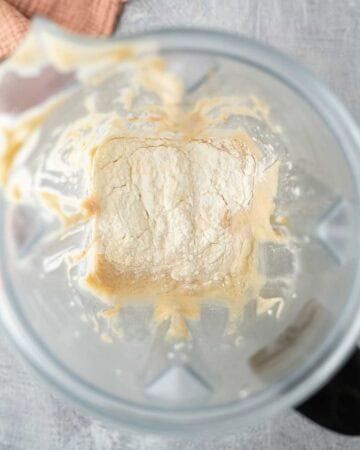 Adding starch thickener to the blender with half of the filling.