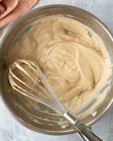 Heating half of the pie filling to activate the starch and agar.