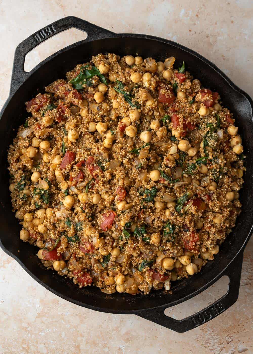 The quinoa fluffed with a fork after cooking.