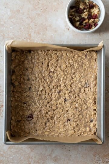 Batter spread into a square baking pan.