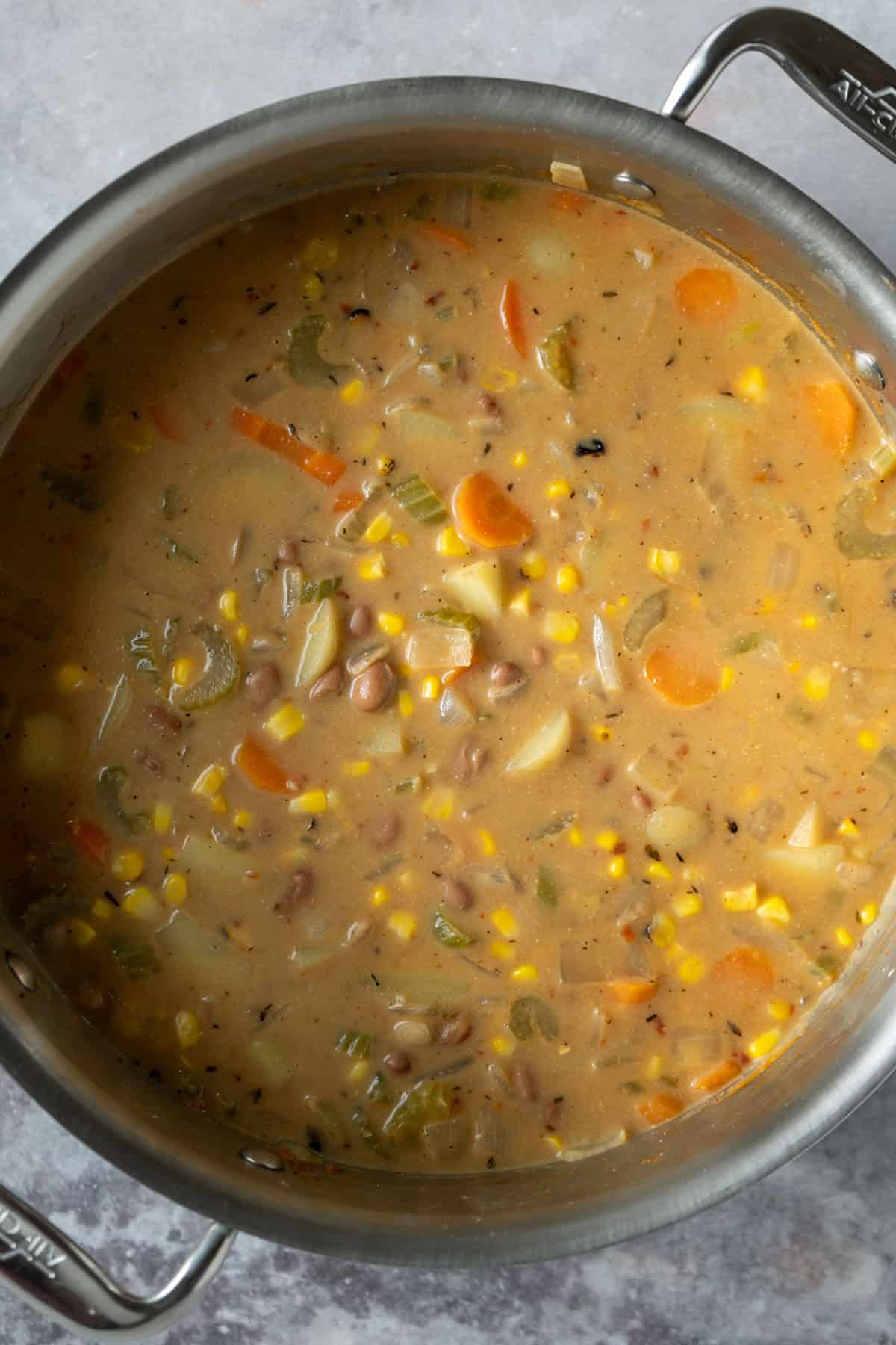 After adding non-dairy milk to the pot the soup looks creamier.