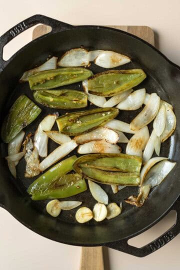 Fully pan-seared salsa ingredients ready to be blended.
