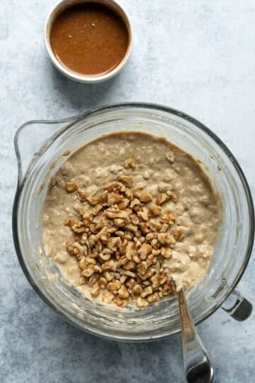Mixing muffin batter in a large bowl.