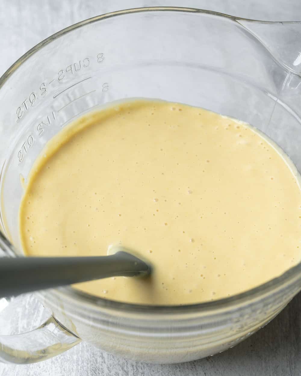 Smooth ice cream base in a bowl after a second blending.