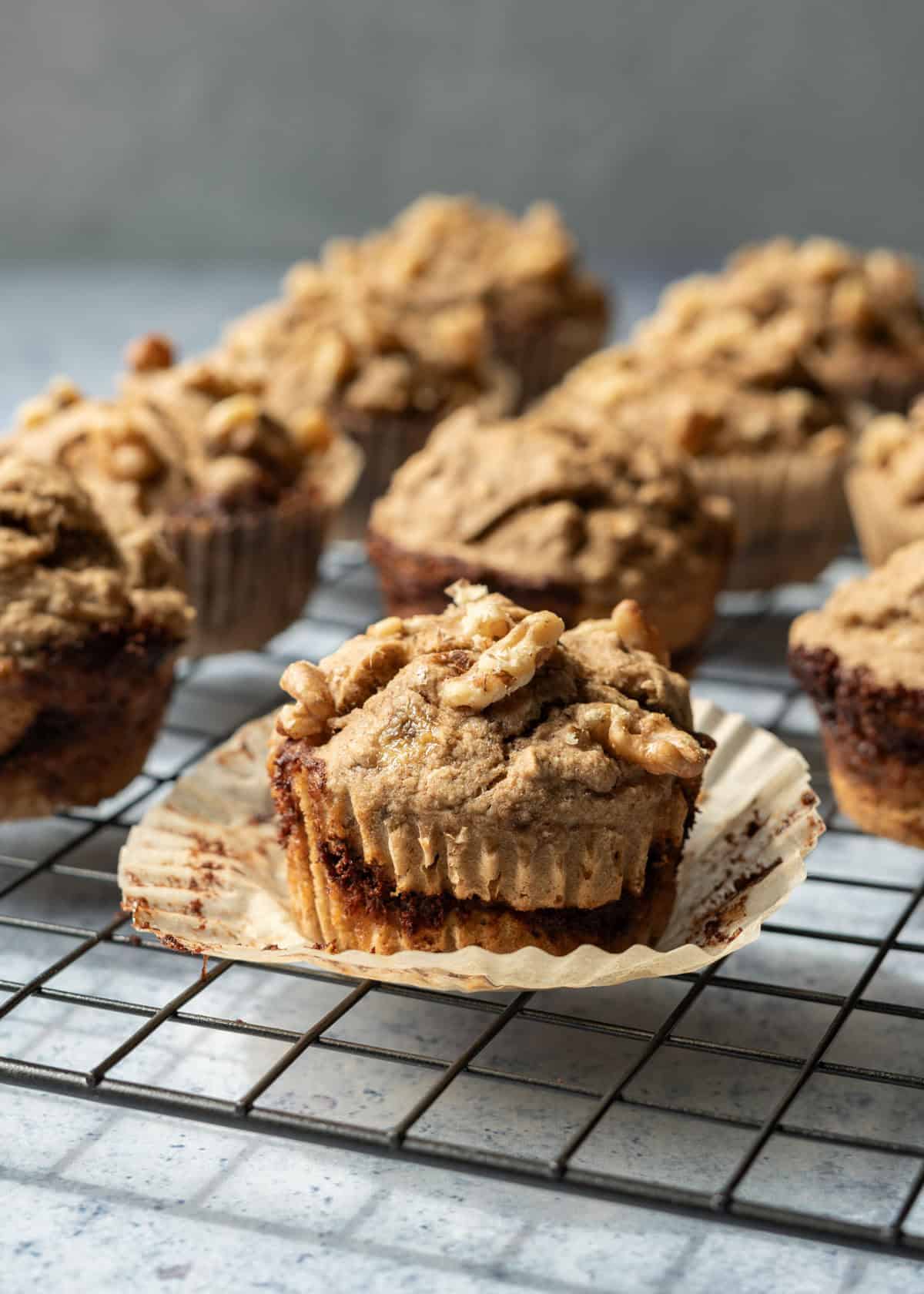 Banana nut muffins on a cooling rack.