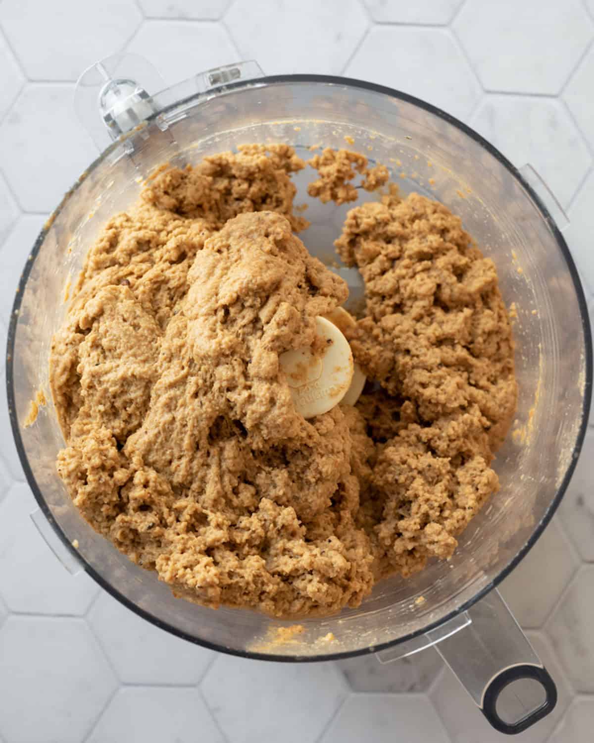 Sausage seitan dough in food processor.