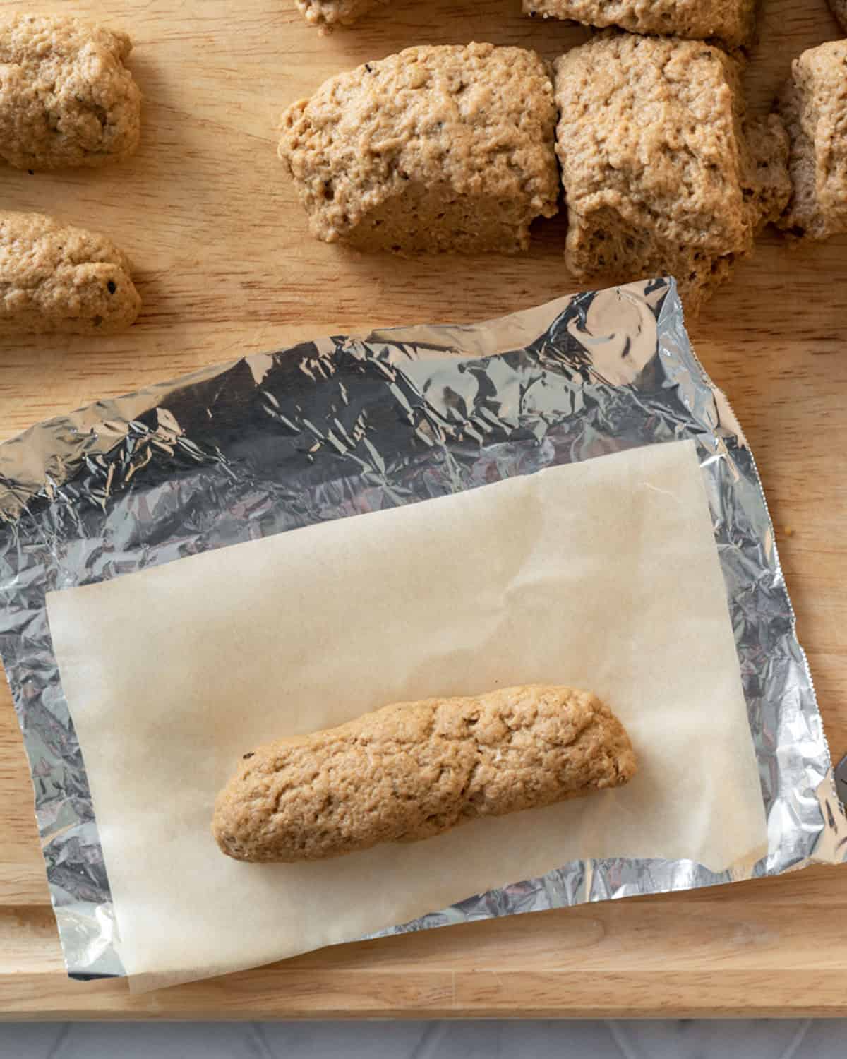 Wrapping seitan breakfast sausage in foil.