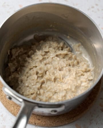 Cooking oats in non-dairy milk for the filling until thick and soft.