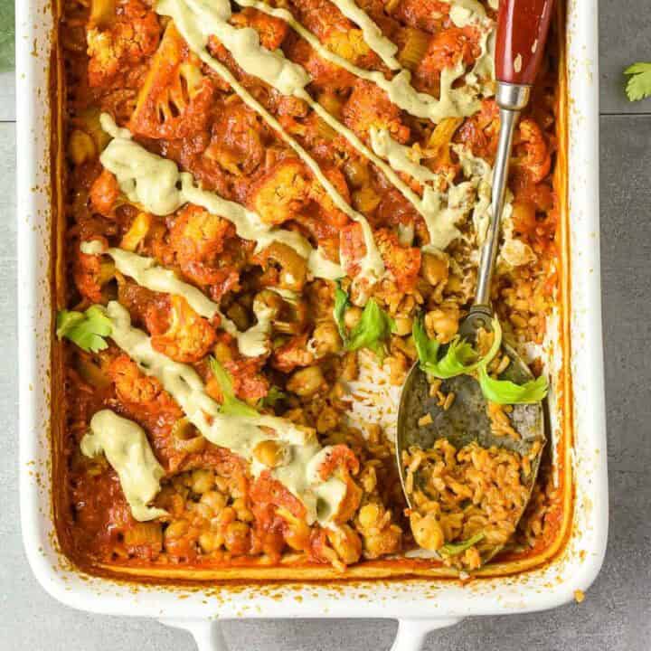 overhead view of buffalo chickpea casserole in a baking dish.